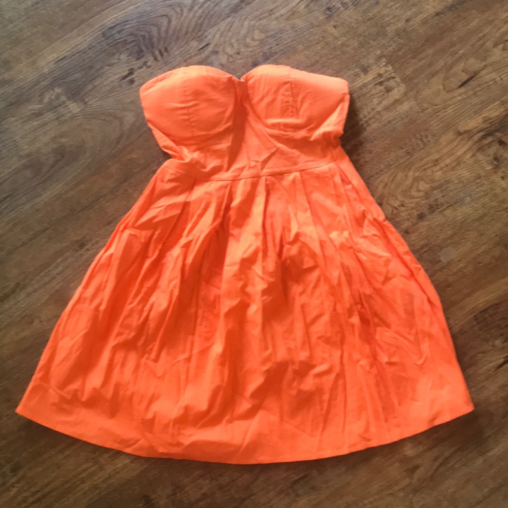 Bright orange strapless dress